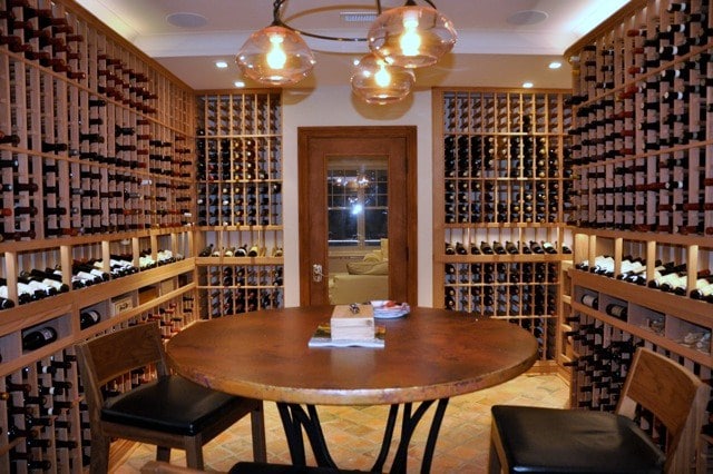 Home Wine Cellar Installed with Custom Wine Cellar Racks and an Efficient Wine Cooling System