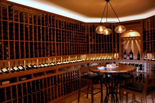 Dramatic Wine Cellar Lighting and Traditional Custom Wine Racks Presidio heights