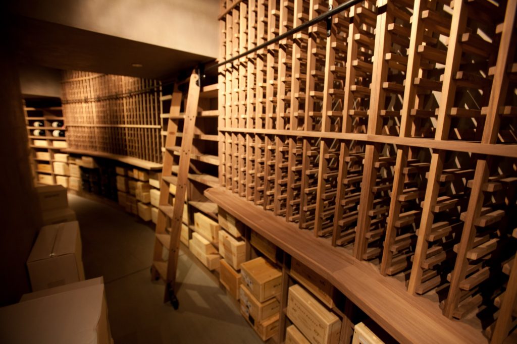 Commercial Custom Wine Cellar Design with Wooden Wine Racks by Phoenix Arizona Experts