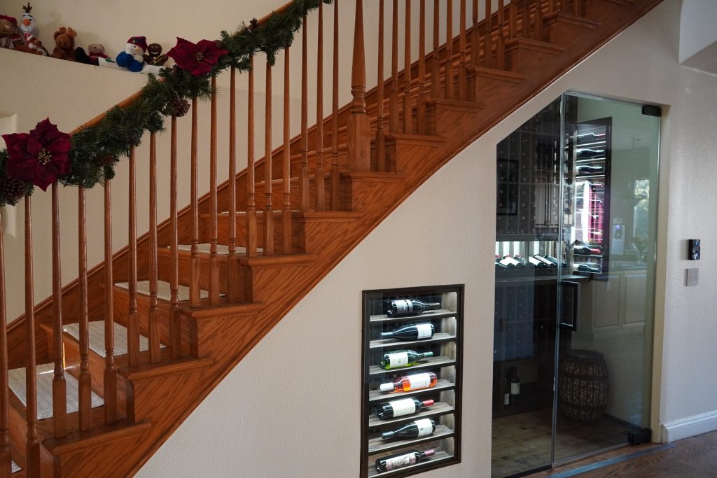 Under-the-Stairs Glass Wine Cellars With Functional Design